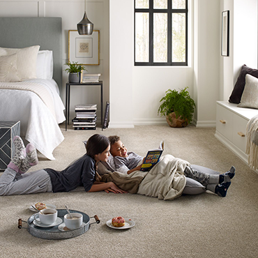 children reading on the floor - Carpet Wholesale Outlet in GA